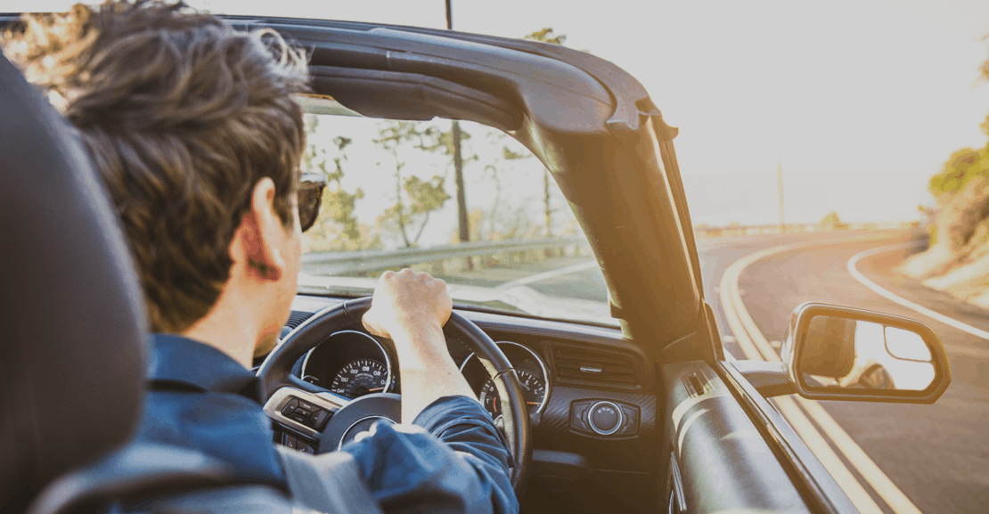 Triple Seven Corfu Car Rental close up picture of man driving a car