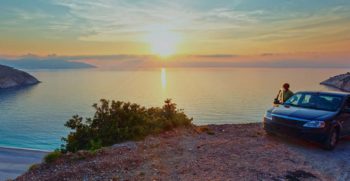 Triple Seven Corfu Car Rental woman looking at the sunset