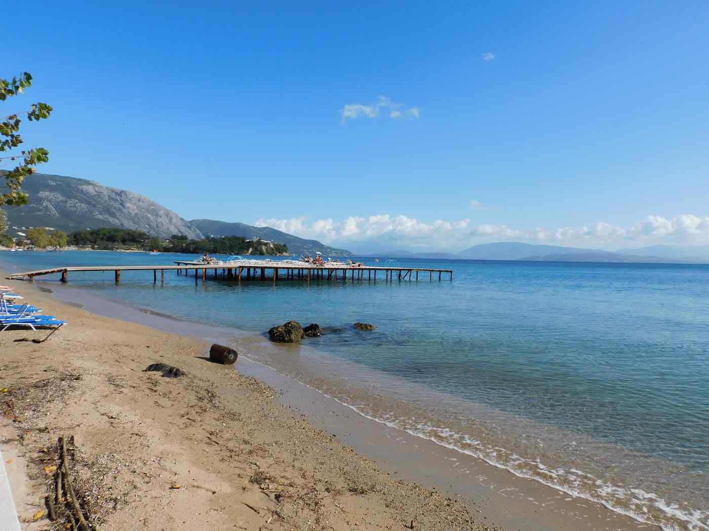Dassia guide — a wooden jetty on Dassia beach