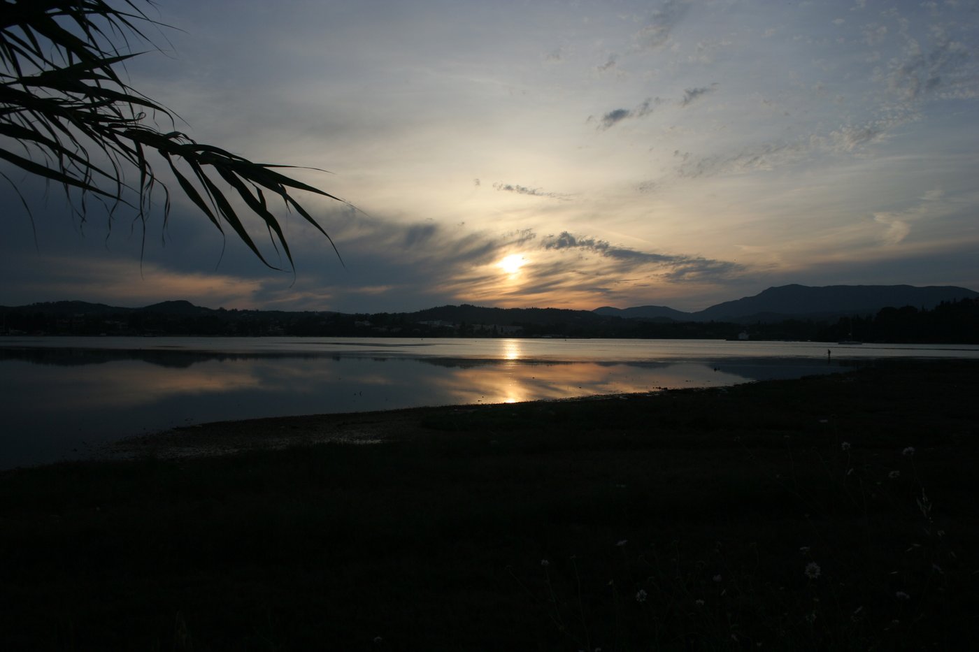 Kontokali Car Rental Corfu — twilight over Kontokali Bay